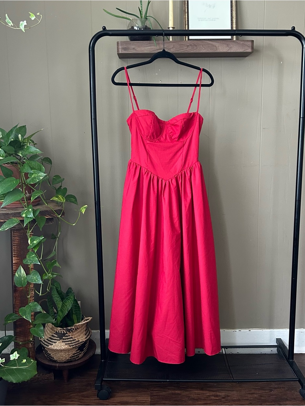 Vibrant red spaghetti strap corset style dress with princess skirt